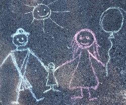 Children's drawing with chalk on the pavement, the family
