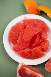 Juicy delicious ripe grapefruit on a plate