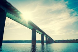 Bridge over water with sunshine