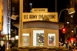 checkpoint charlie berlin germany at night
