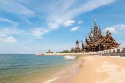 the sanctuary of truth on the seashore in pattaya,  thailand.