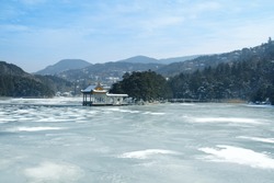 winter landscape with lake covered with ice. lushan ,China