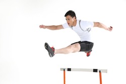 Man jumping hurdle