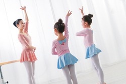 Young dance teacher to teach the little girls dance
