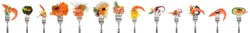 Variety of seafood appetizers on forks - white background