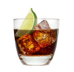 Cuba libre or vodka and cola with lime wedge isolated on white background
