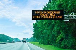 Highway alert: Covid-19 checkpoint ahead, overhead sign in Florida on state border