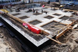 construction of concrete foundation of building, horizontal