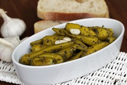 Green peppers marinated in garlic with white bread.