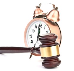 Gavel and old clock