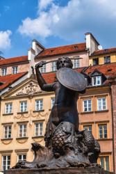 Mermaid of Warsaw called Syrenka in Warsaw, Poland, city symbol in the Old Town, bronze statue designed by Konstanty Hegel in 1855.