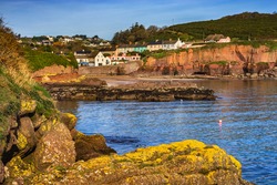 Town of Dunmore East and scenic sea coast in Ireland, County Waterford.