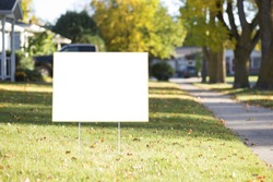 blank yard sign during sunny autumn weather