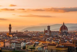 Golden sunset over Palazzo Vecchio and Cathedral of Santa Maria del Fiore (Duomo), Florence, Italy