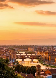 Golden sunset over the river Arno and Ponte Vecchio, Florence, Italy
