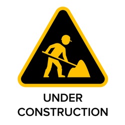 Under construction sign with man digging ground