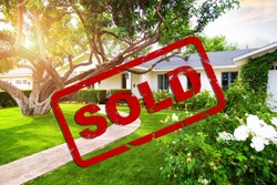 Beautiful single family home with red sold stamp overlay