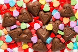 Pile of assorted chocolate and sugar heart shaped Valentine's Day candy