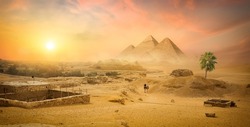 Egyptian pyramid in sand desert and clear sky