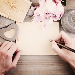 Vintage Background with Male Hands, Pen and Paper. Man Writing Love Letter