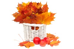 beautiful arrangement of autumn leaves and red apples - isolated on white