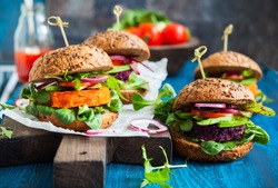Veggie beet and carrot burgers with avocado