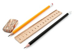 erasers, pencil, ruler on a white background