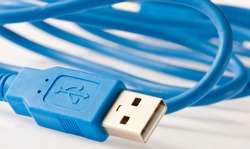Close-up view of a blue USB cable