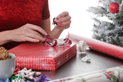 Woman wrapping christmas presents
