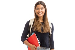 Smiling female student enhancing her future by attending regular lectures