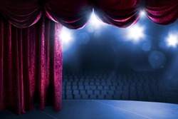 Theater curtain with dramatic lighting and lens flare