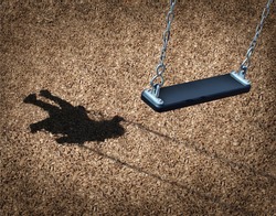 Missing child concept with an empty playground swing and the shadow of a little girl on the park floor as a symbol of children losing their childhood as being lost in a failed adoption or despair.