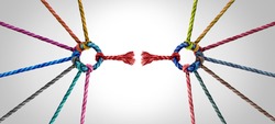 Broken team and divided Industry partnership and divided teamwork concept as a small business metaphor for breaking apart a big team as diverse ropes connected as a corporate symbol.
