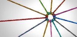 Working team unity and teamwork concept as a business metaphor for joining a partnership as diverse ropes connected together as a corporate symbol for cooperation and worker collaboration.
