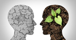 Climate change psychology as a dried or dry cracked land suffering from drought versus rich moist organic earth with a growing young plant in the shape of a human head as a composite.