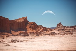 The moon in the Moon Valley in Atacama Desert, Chile
