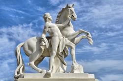 Sculpture of a man with horse near Upper Belvedere, Vienna, Austria