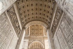 The Arc de Triomphe in Paris as seen from under the arc
