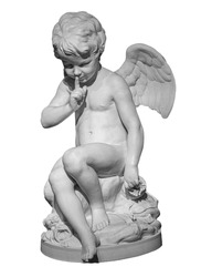 White angel figurine isolated on white background. Cupid sculpture. Stone statue of young cherub