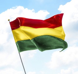 Flag of Bolivia Raised Up in The Sky