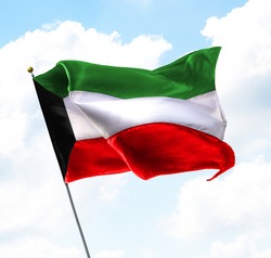 Flag of Kuwait Raised Up in The Sky