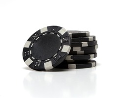 Small stack of black poker chips.