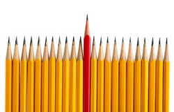 Red pencil standing out from the crowd on white background.