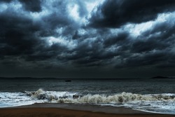Storm seascape with dark clouds.