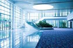 Modern architecture of large business conference center with blue tone.