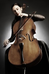 Cello player cellist playing music instrument Classical orchestra musician