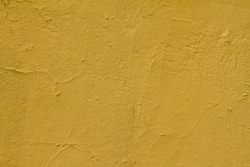 Piece of yellow wall useful for a background