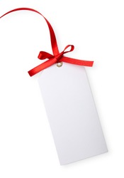 close up of card note with red ribbon on white background