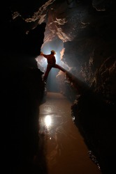 Man exploring a cave