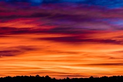 Spectacular Sunrise with Red and Orange Streaks